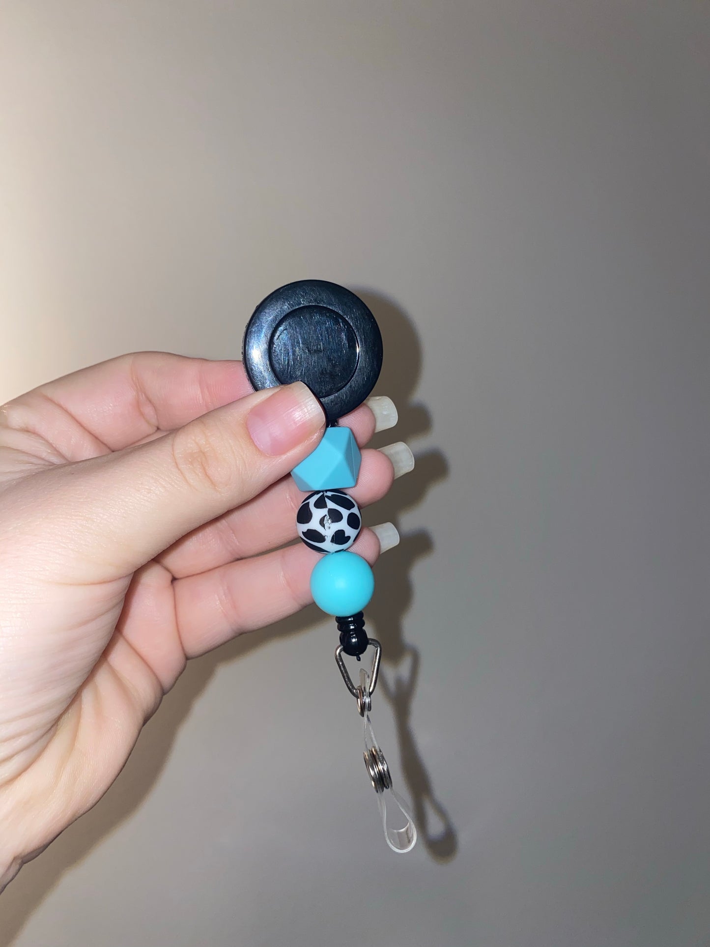 Blue Cow Badge Reel