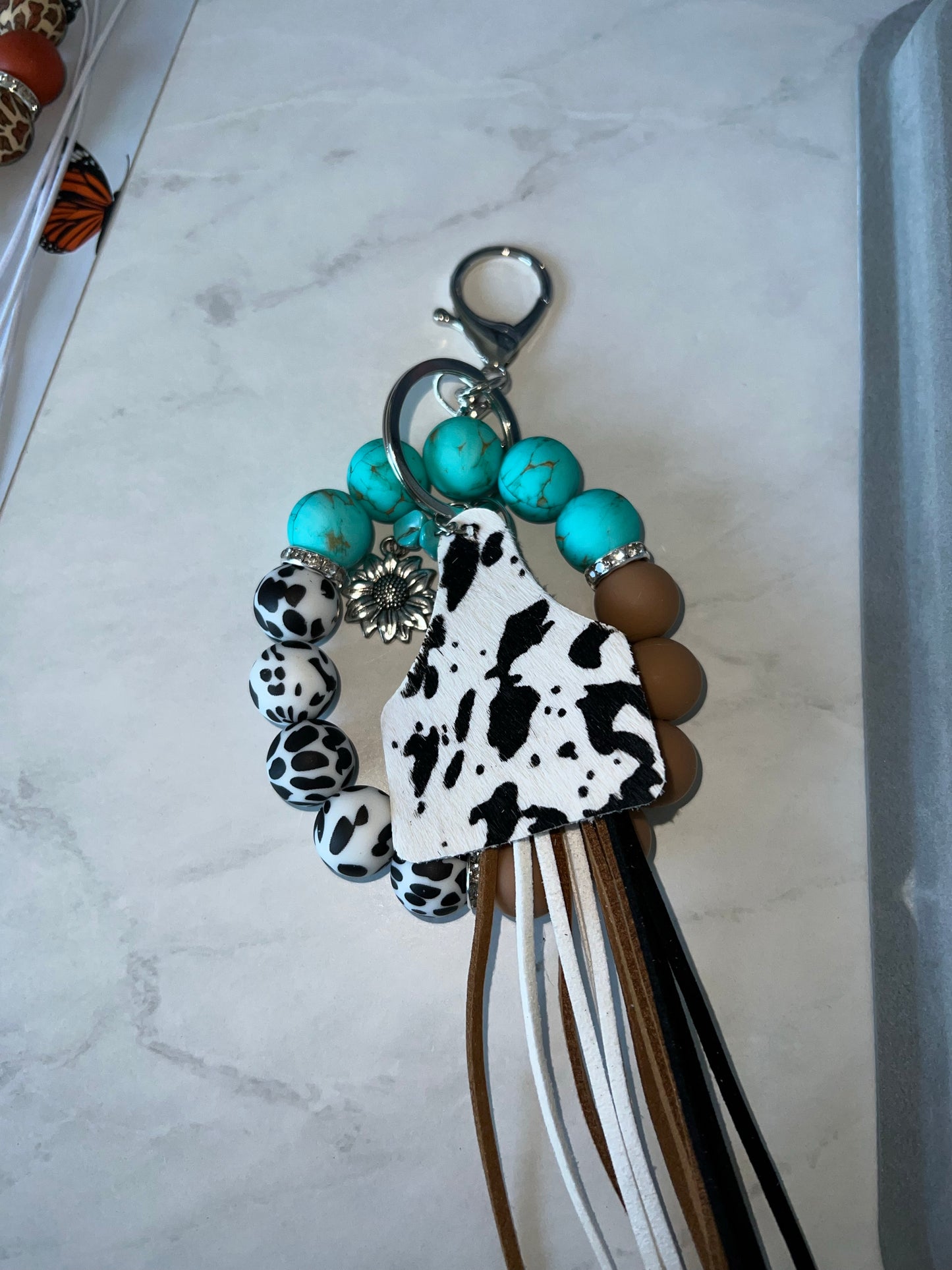 Cow Print Turquoise Wristlet