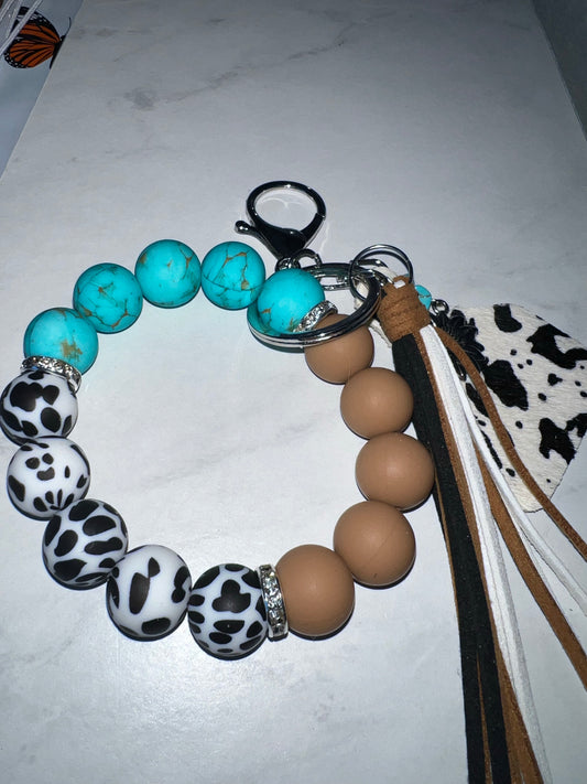 Cow Print Turquoise Wristlet