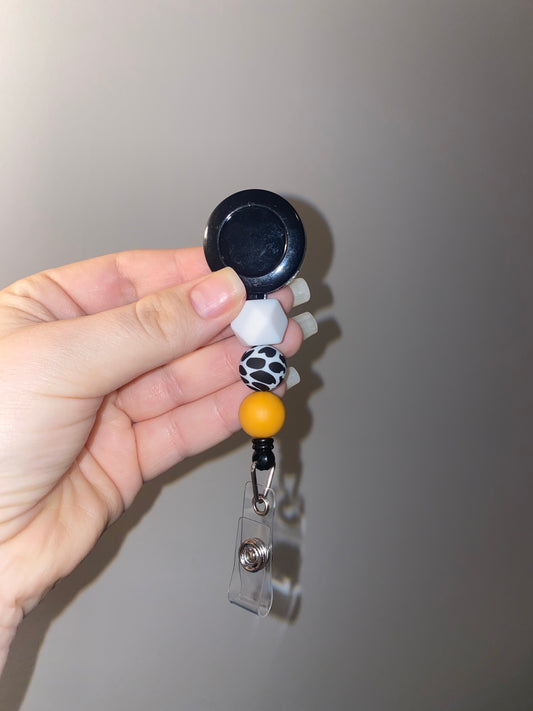 Tangerine Cow Badge Reel